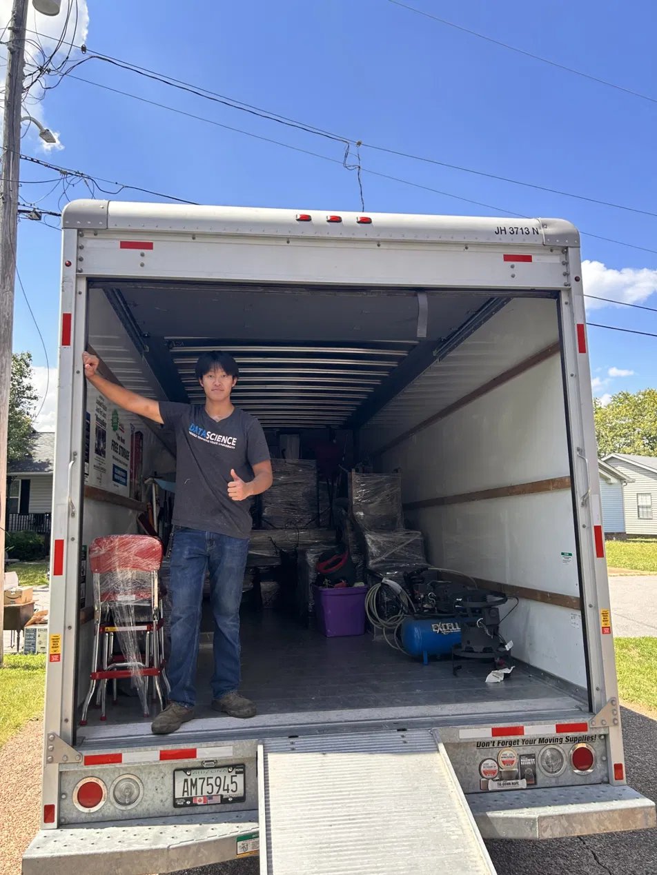SmartStack Moving crew member at the back of a fully packed rental truck in Murfreesboro TN